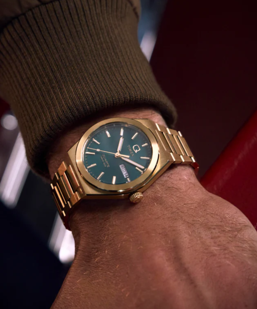 Q Timex® Continental Day and Date Gold and green