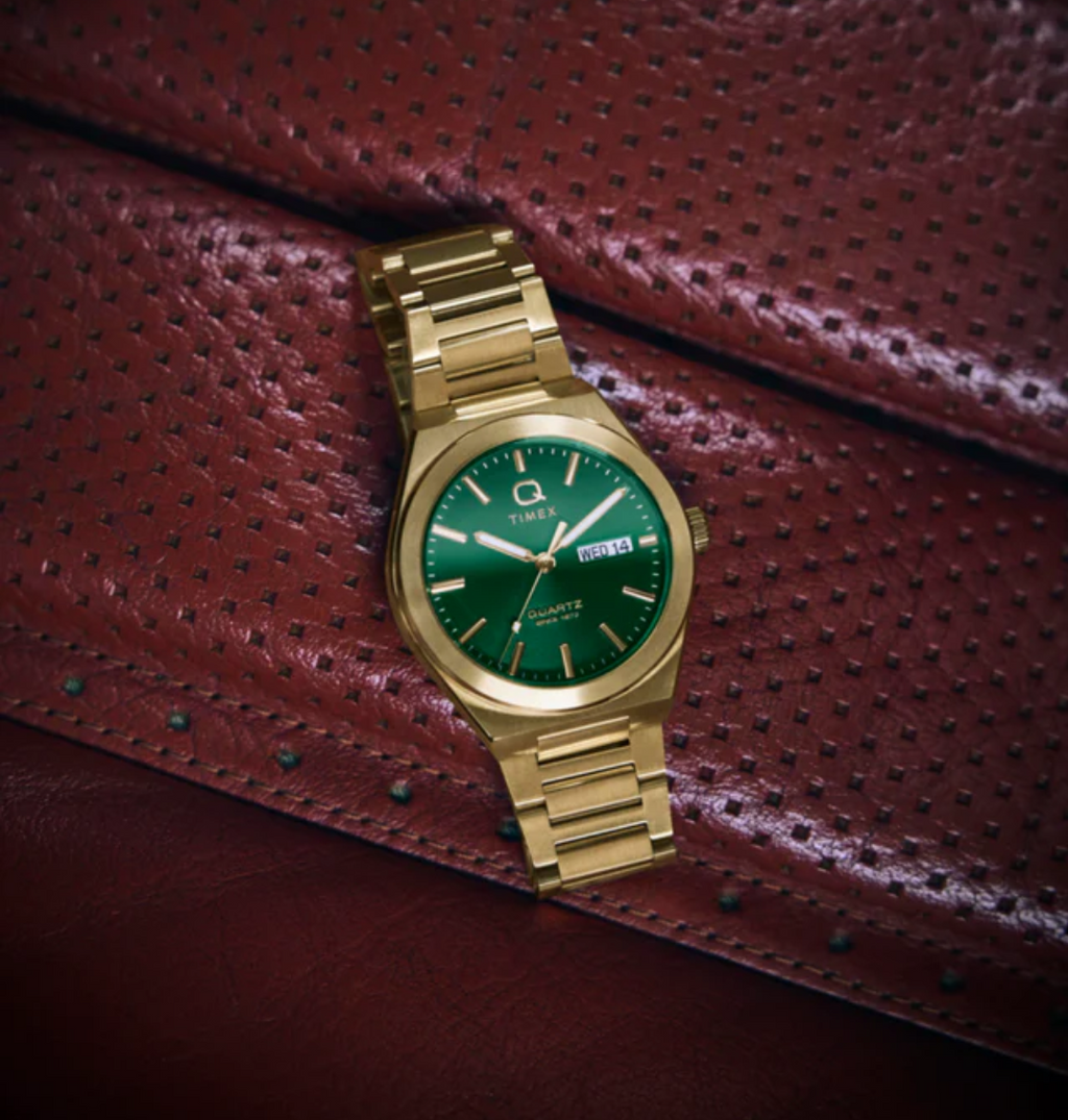 Q Timex® Continental Day and Date Gold and green